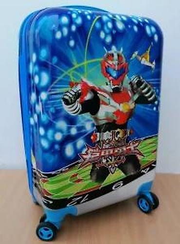 Rančevi, torbe i koferi: Dečiji putni kofer sa upečatljivim dizajnom crtanog junaka. Kofer je — 16