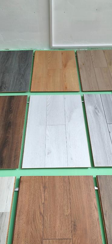 dosəmə laminat: Laminat döşəmə panelləri – müxtəlif rəng və fakturalar - Material — 1