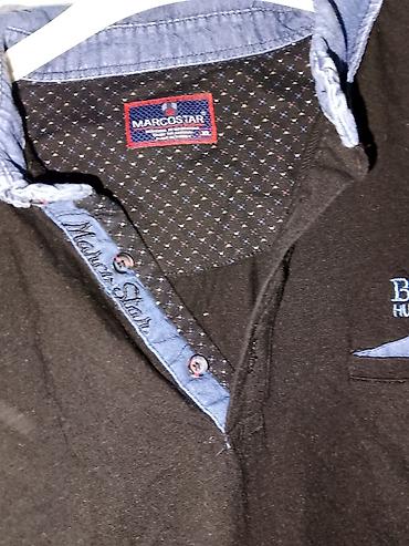 Majice: Muške polo majice – 2 komada Svaka majca po 600dinara 1) Infinity Man — 18