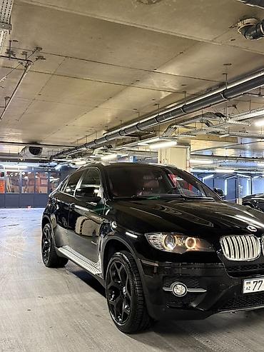 zapi masin: BMW X6 – qara rəng, kupe-SUV dizaynı. Güclü və dinamik görünüş, ikili — 6