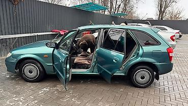 Mazda: Mazda 323: 2003 г., 1.6 л, Автомат, Бензин, Универсал — 5