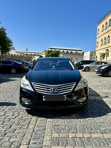 Hyundai: Hyundai Azera – biznes sinfi sedan Xüsusiyyətlər: - Korpusu: 4 qapılı — 1