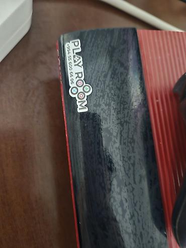 Sony PlayStation 3 Super Slim (qırmızı) - Rəng: qırmızı korpus, üstə lalafo.az -da Sony PlayStation 3 Super Slim (qırmızı) - Rəng: qırmızı korpus, üstə