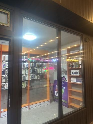 Торговый павильон/остров для продажи мобильных аксессуаров и SIM‑карт at lalafo.kg Торговый павильон/остров для продажи мобильных аксессуаров и SIM‑карт