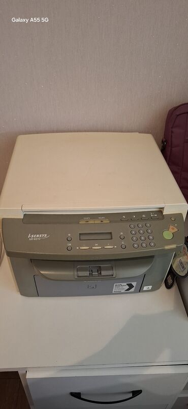компьютер для офиса: Многофункциональное устройство Canon i-SENSYS MF4010, объединяющее