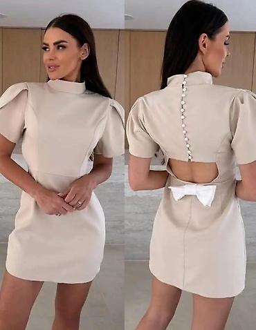 torbe puta: Elegantna mini haljina sa puf rukavima i visokim okovratnikom - Kroj — 4