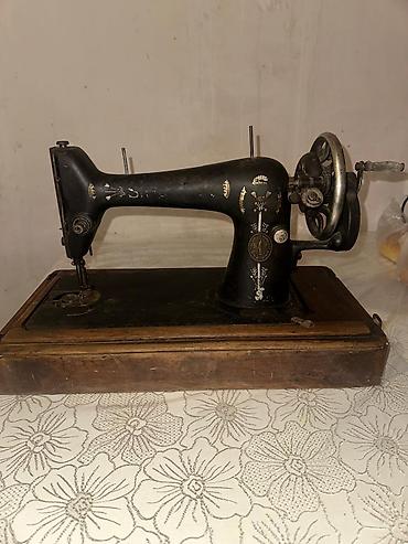 velosiped sadə: Məhsul: Singer tikiş maşını (mexaniki), taxta əsaslı stolüstü model — 1
