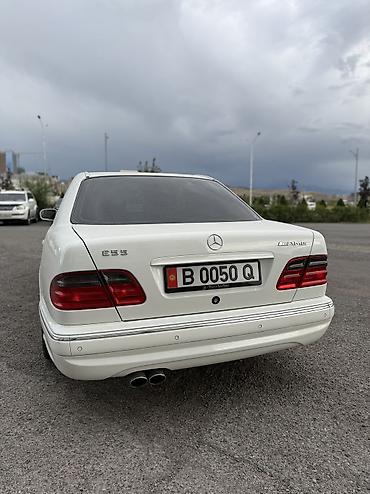 мв 100: Mercedes-Benz E-класс AMG: 2002 г., 5.5 л, Автомат, Бензин — 6