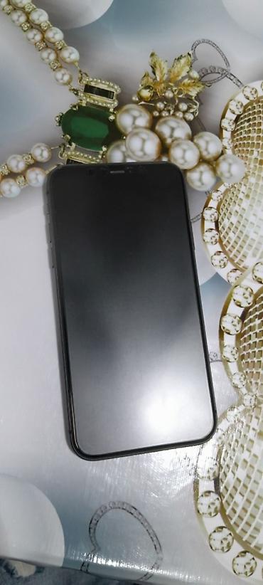 Apple iPhone: IPhone 11, Qara, Face ID — 4