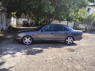opel astra amartizator: Mercedes-Benz E-Class: 2.4 l | 1998 il Sedan — 9