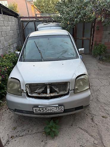 g comp: Mitsubishi Dion: 2004 г., Бензин — 1