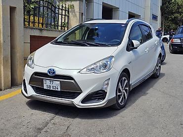 prius spoyler: Toyota Aqua Hybrid, ağ rəng, hetçbek gövdə. Əsas xüsusiyyətlər: - — 2