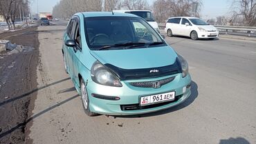 левый руль форестер: Хэтчбек Honda Fit бирюзового цвета, представленный на двух