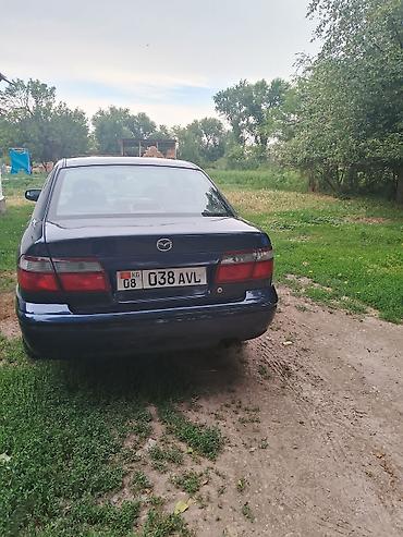 smart plus: Mazda 626: 1997 г., 1.8 л, Механика, Седан — 5