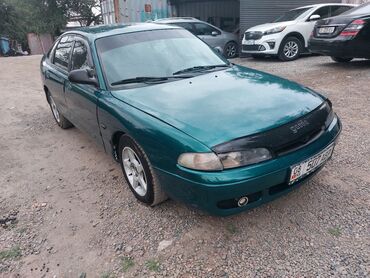 деловые автомобили: Mazda 626: 1993 г., 2 л, Механика, Бензин, Хэтчбэк