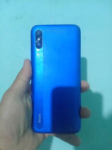 samsung a14: Смартфон Redmi (синего цвета) - Корпус: матовый пластиковый, цвет — — 1
