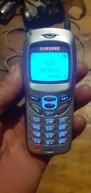 Техника и электроника: Samsung < 2 ГБ, цвет - Серебристый, Кнопочный — 1