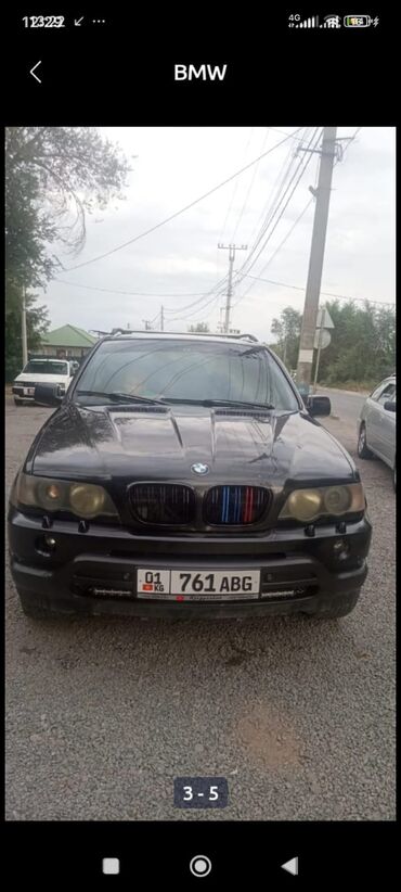 семёрка машина: Черный внедорожник BMW X5, первое поколение (E53). Автомобиль оснащен