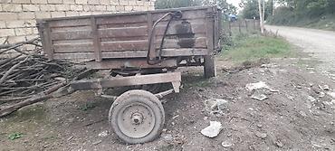 Traktorlar: Mavi rəngli MTZ tipli təkərli traktor Xüsusiyyətlər: - Dizel — 13