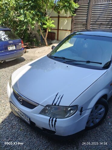 майбах семейный: Mazda Familia: 2001 г., 1.5 л, Автомат, Бензин, Седан