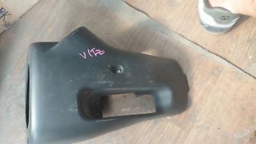 кожух: Кожух рулевой колонки для Toyota Vitz - Оригинальная пластиковая — 1