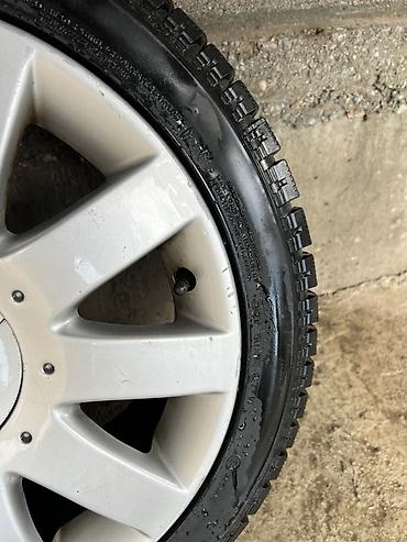 e34 4 4: Оригинальное колесо Nissan в сборе: - Литой диск Nissan, 10‑спицевый — 6