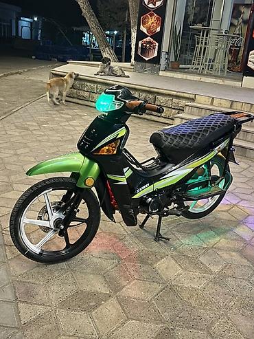 Mopedlər,skuterlər: Moped/skutər – şəhər içi rahat gediş üçün yığcam və qənaətcil model — 1