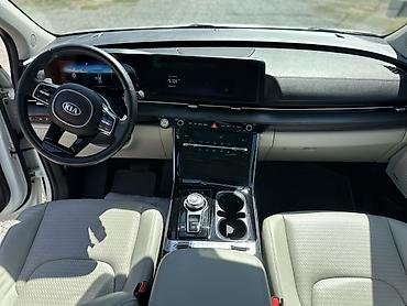 Kia: Kia Carnival: 2020 г., Минивэн — 12