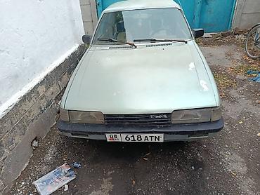 Mazda 626: 1998 г., 1.6 л, Механика, Бензин, Седан