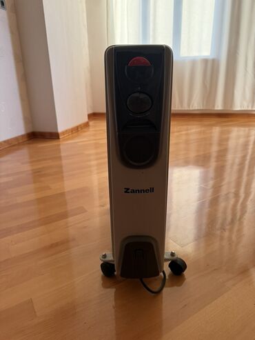 peraski qutab bisiren: Масляный радиатор