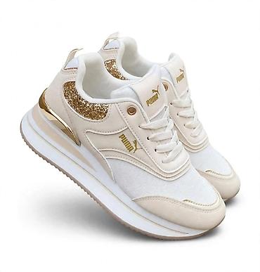 air max 90 id: Ženske patike Puma – bež/šampanj ton sa zlatnim detaljima - Dizajn — 1