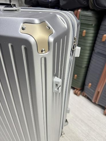 ice berlin: Жёсткий чемодан на колёсах, серебристый - Корпус: прочный жёсткий — 7