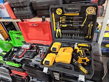 Наборы электроинструментов: Cordless Tool Kits in Cases Description: - Various professional tool — 1