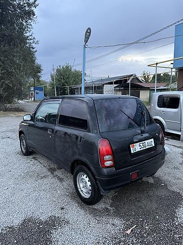 муравей с бензином: Daihatsu Cuore: 2001 г., 1 л, Механика, Бензин, Купе — 4