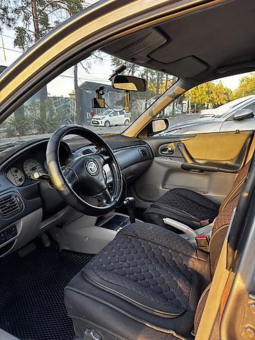 mazda 2004: Mazda 323: 2003 г., 1.6 л, Автомат, Бензин, Хэтчбэк — 8