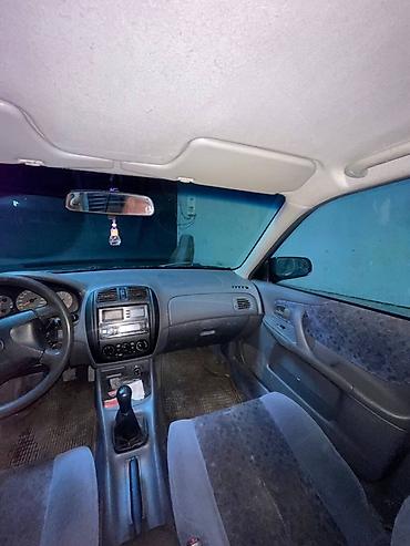 червяк 124: Mazda 323: 1999 г., 1.5 л, Механика, Седан — 8