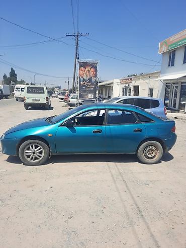 мазда 323 1994: Mazda 323: 1995 г., Хэтчбэк — 3