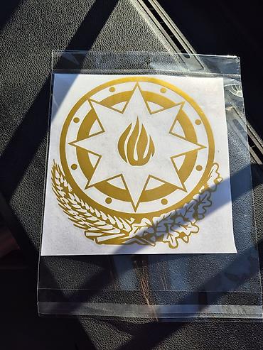 винил: Qızılı rəngdə Azərbaycanın gerbi naxışlı vinil stiker - Material — 1