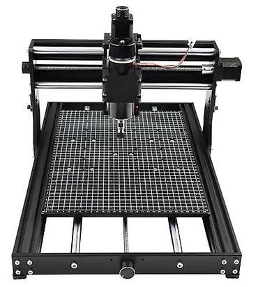 frez taxta: **Masaüstü CNC Cihazı – 40W lazerli CNC 4030 Pro** CNC 4030 Pro oyma — 2