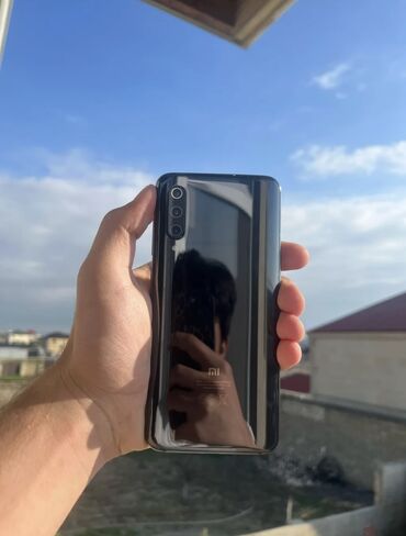 Xiaomi: Xiaomi Mi 9, 64 GB, rəng - Qara, 
 Barmaq izi, İki sim kartlı, Face ID