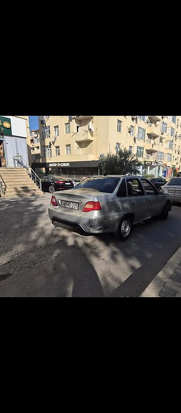 Daewoo Nexia, sedan, gümüşü rəng. - Yanacaq: benzin - Sürətlər qutusu