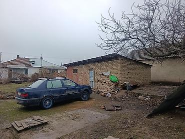 Продажа коттеджей и домов: Продаётся одноэтажный частный дом с участком и воротами. участок 7 — 9