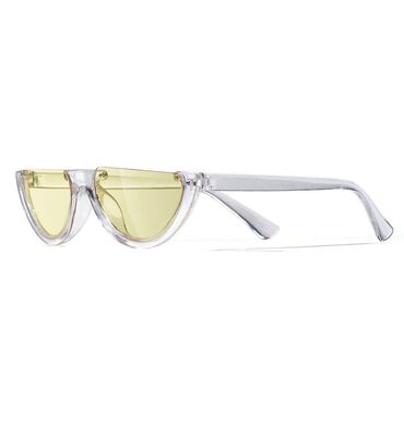 линза для глаз: Стильные очки с прозрачной оправой и желтыми линзами. Производство