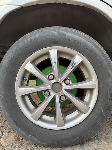 diska 13: Литые диски R14 (кажется 4/100) с шинами Dunlop - Комплект колес на — 1