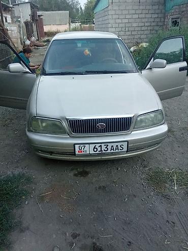 дайхатсу move: Daihatsu Applause: 1998 г., 1.6 л, Бензин — 2