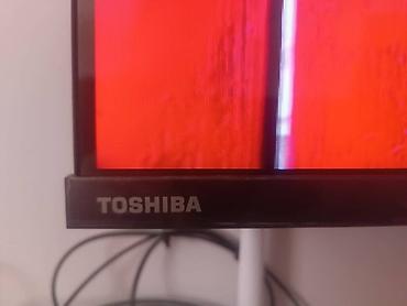 android box: Телевизор TOSHIBA, диагональ около 55–60". Тонкие рамки, крепление на — 2