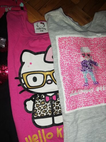 Kompleti: Bluzice vel prvi i drugi red110, treci 110-116 i dve 122-128, H&M — 8