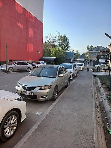 Mazda 3: 2004 г., Седан