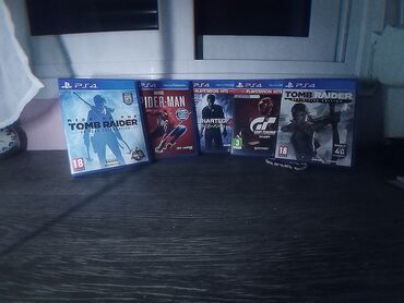 PS4 games -Uncharted 4. -Spider-Man (2018). -Gran Turismo Sport. -Tomb