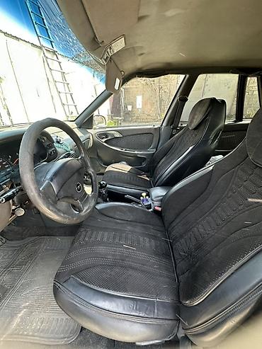 Opel: Model: daevoo Espero Rəng: qızılı/şampan Kuzov: 4 qapı, geniş salon — 10